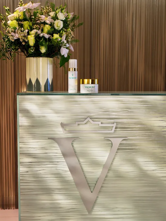 Reception details with a flower bouquet and cosmetics products at Spa Valmont pour Le Meurice, Paris - Dorchester Collection