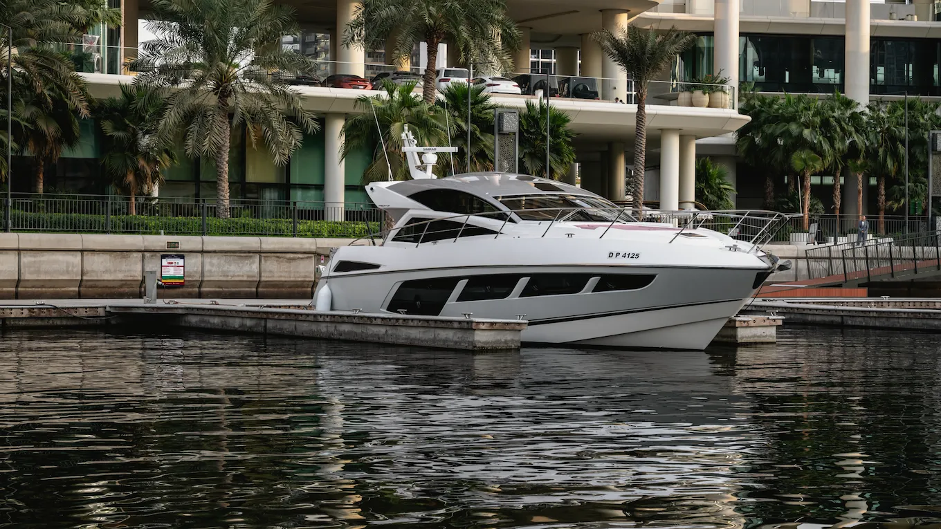 The boat docked in front of The Lana