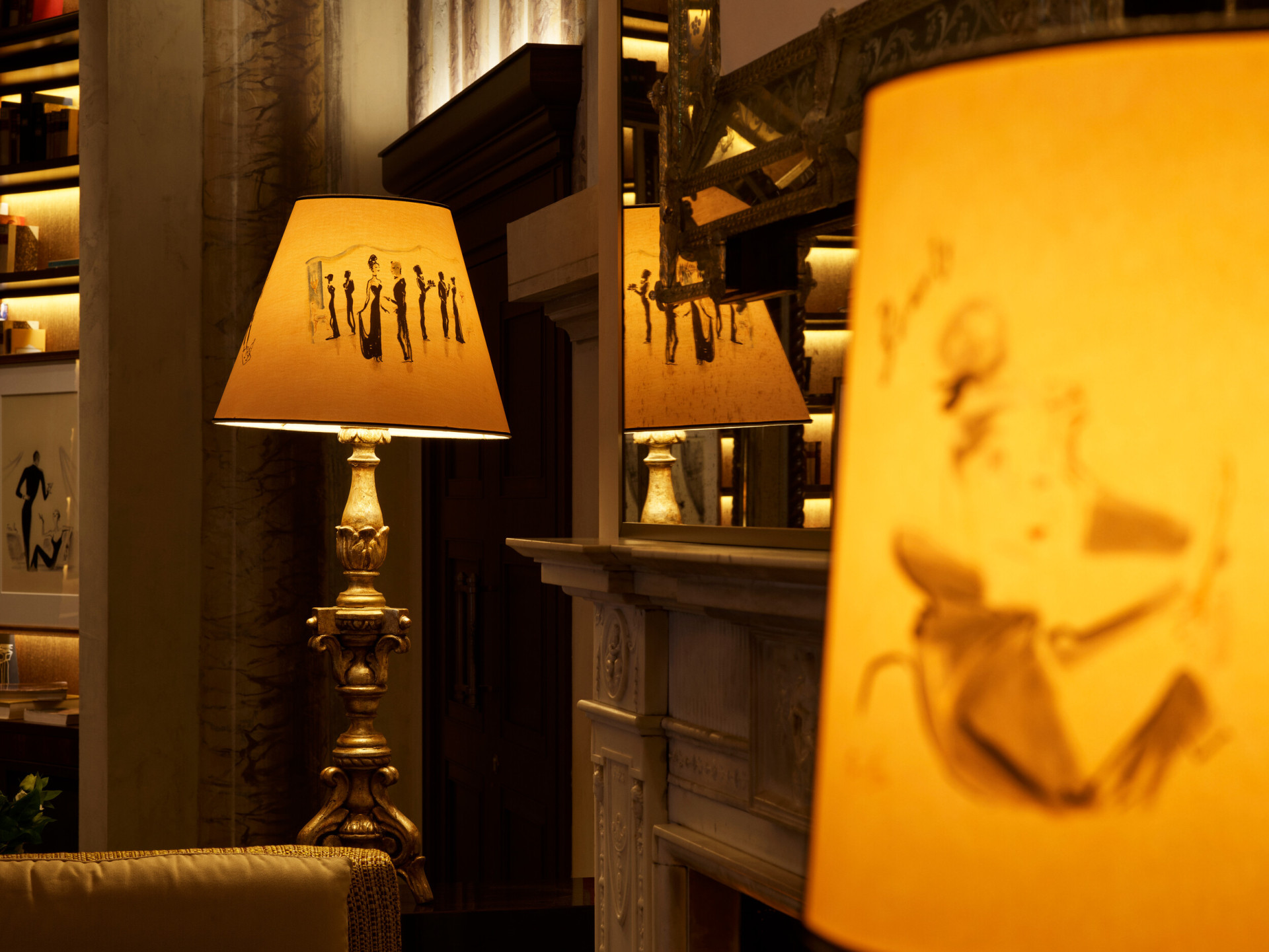 	Lampshades with illustrations by Italian fashion illustrator Andrea Ferolla at La Libreria at Hotel Eden, Rome
