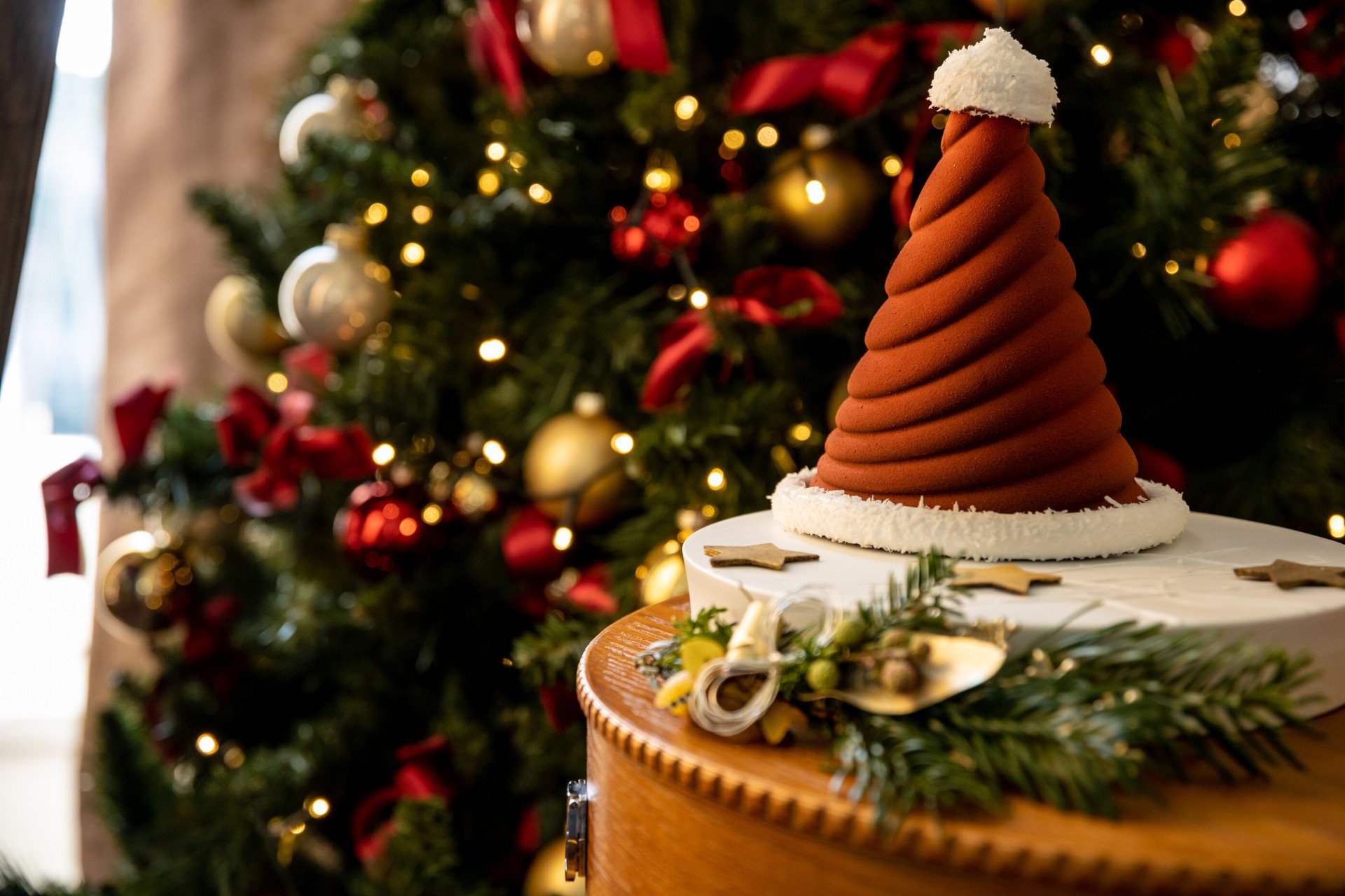 Chocolate Santa hat and Christmas tree inside suite at Hotel Eden, Rome