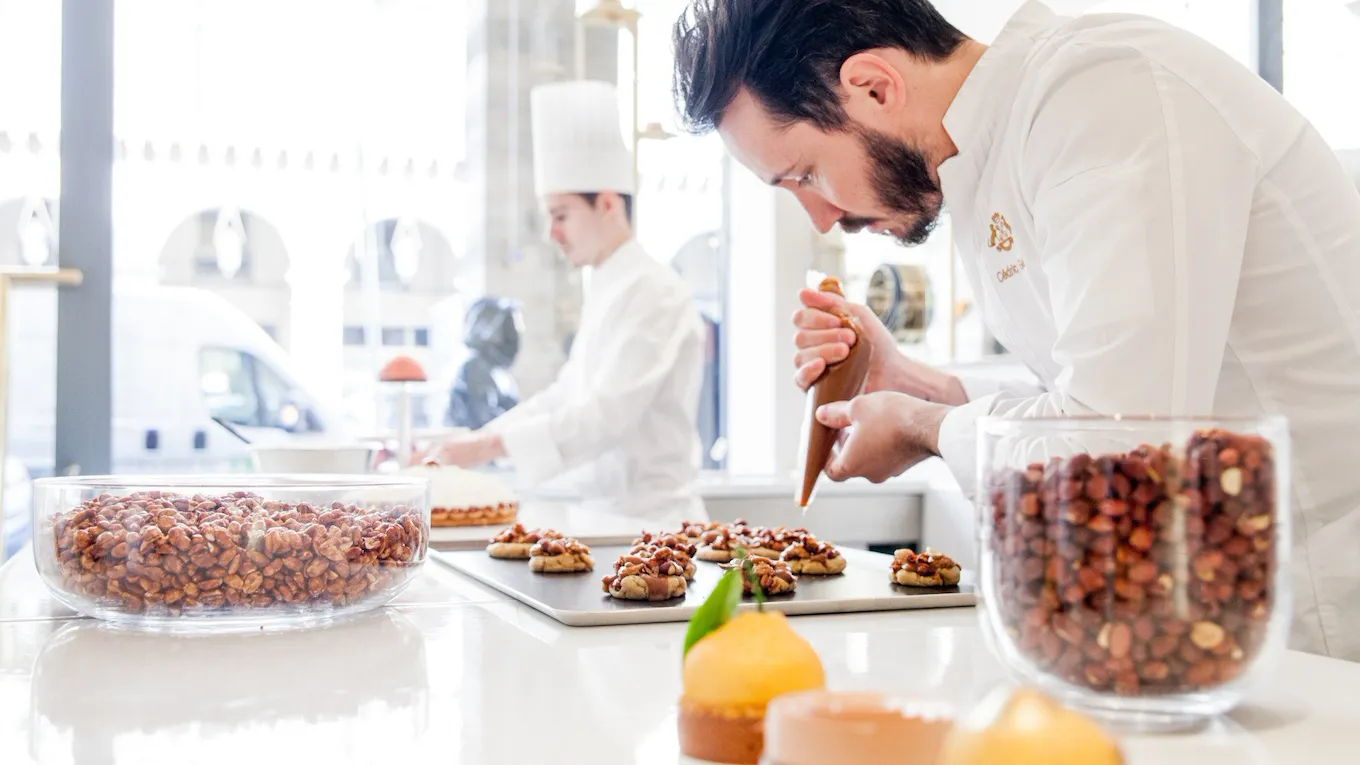Cedric Grolet at work at boutique at Le Meurice, Paris