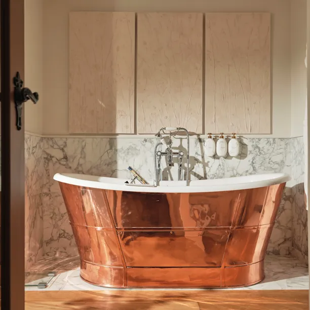 Dower House Master Bathroom with copper roll top bath at Coworth Park