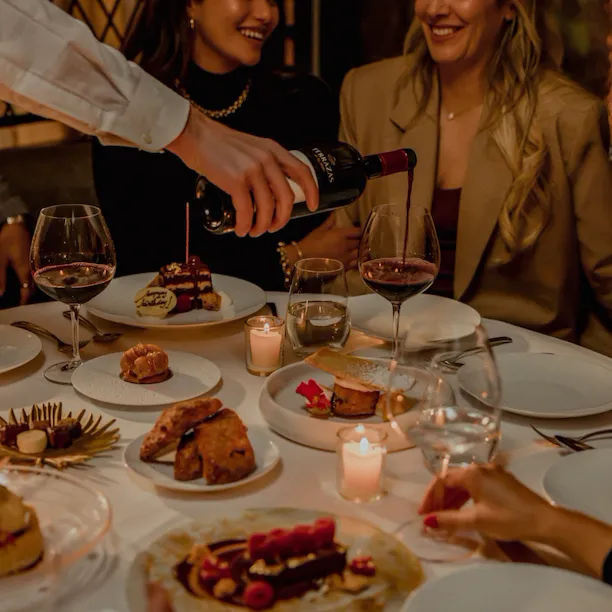 Dining in alcove at The Restaurant at Hotel Bel-Air, Los Angeles