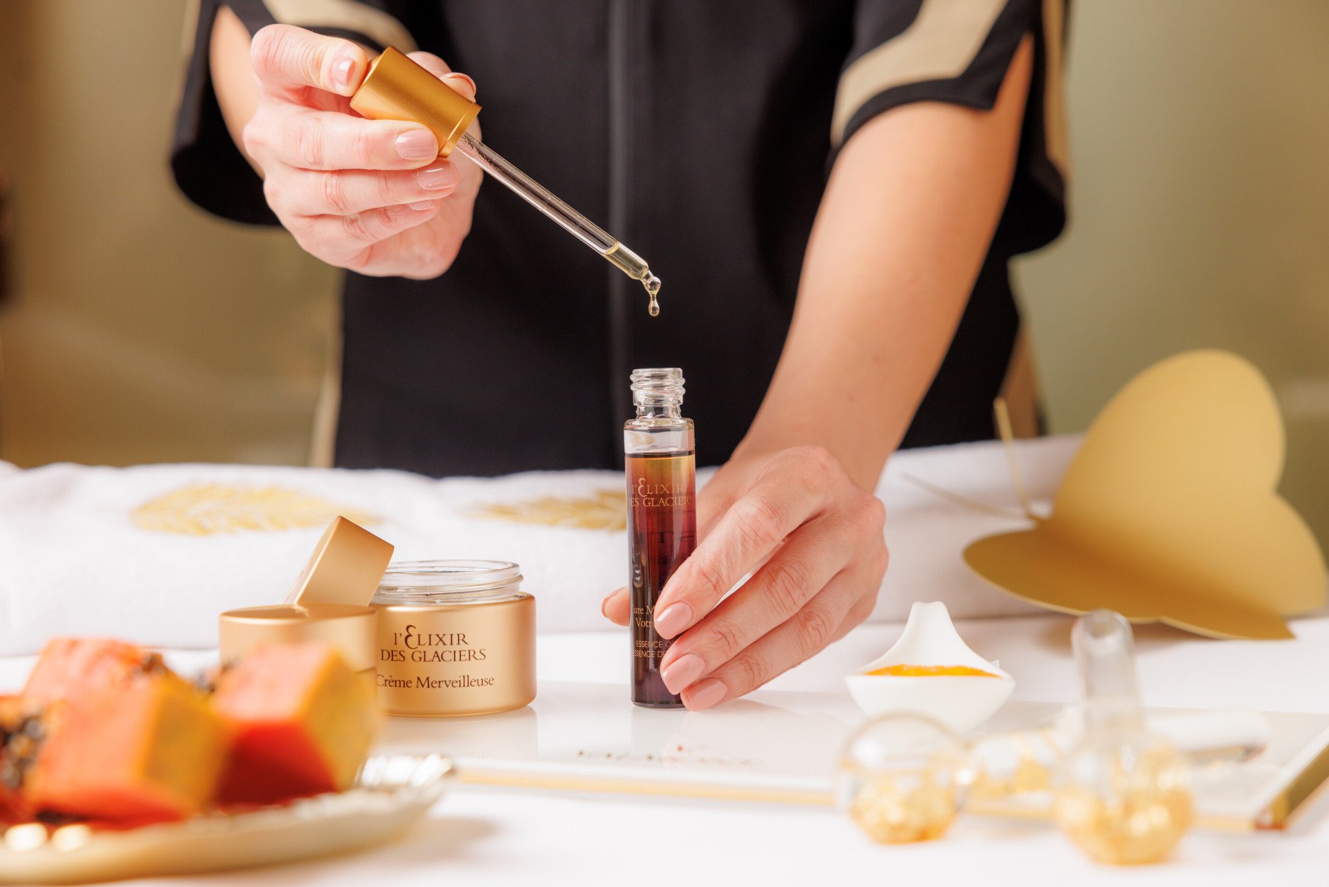 Spa therapist who is actively using Valmont product Elixir des Glaciers