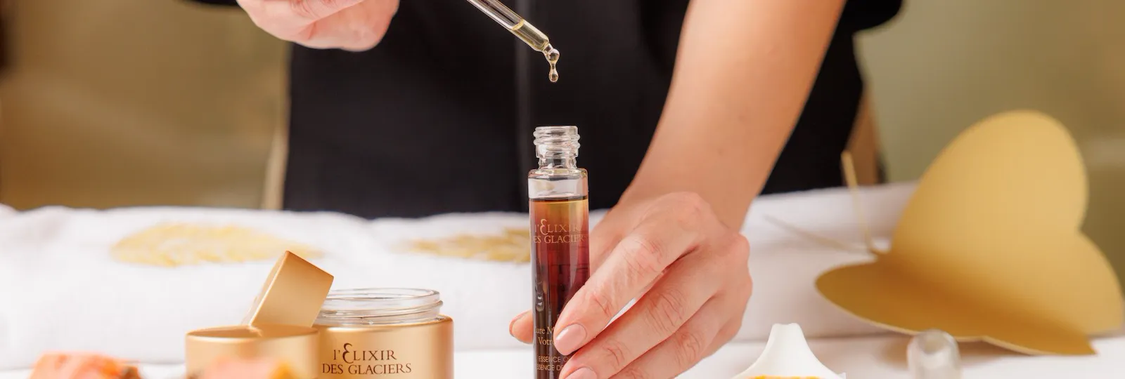 Spa therapist who is actively using Valmont product Elixir des Glaciers