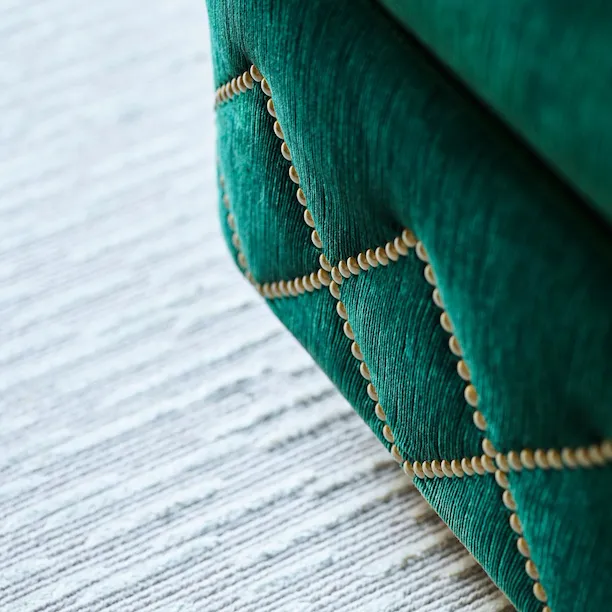 Details of chair and carpet in bungalow at The Beverly HIills Hotel
