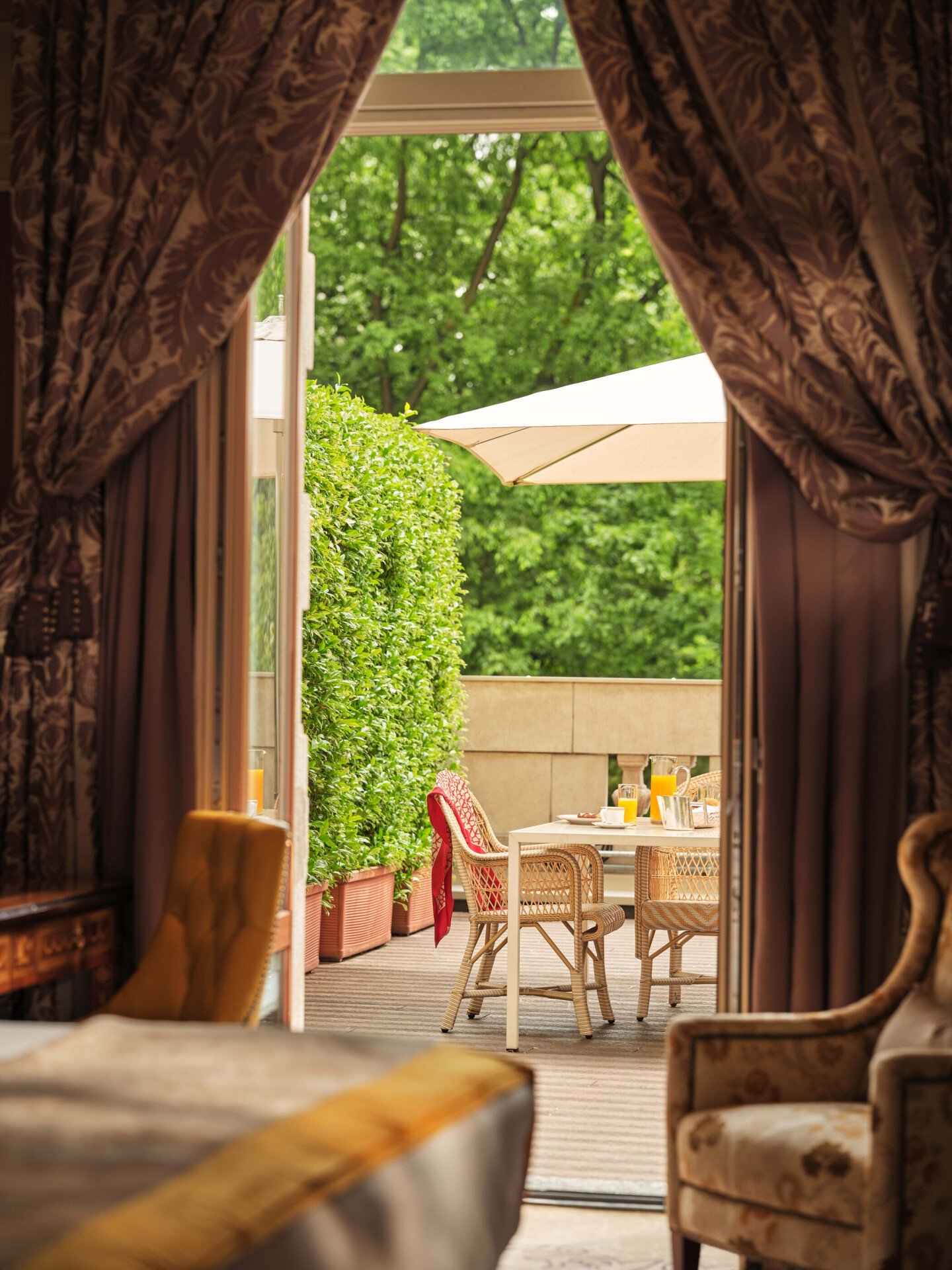 View of the terrace from the Deluxe Terrace Room with external forniture in the background