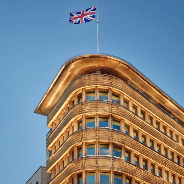 Union Jack flag flying on top of 45 Park Lane, London