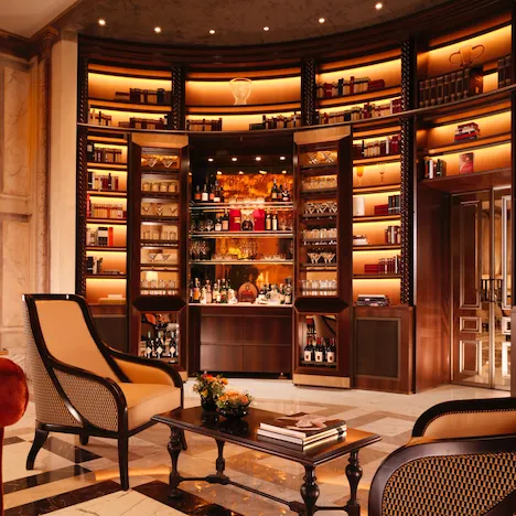 Secret bar with open doors at La Libreria lobby lounge at Hotel Eden, Rome