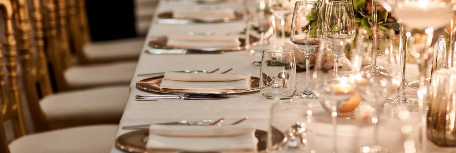 Cristalli Gala Room table set up for event with waiter arranging table at Hotel Principe Di Savoia, Milan