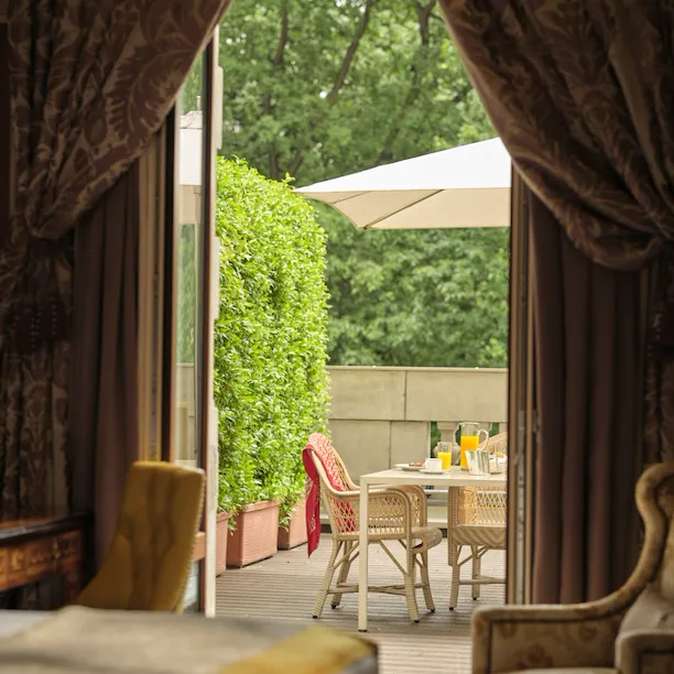 View of the terrace from the Deluxe Terrace Room with a red detail in the background