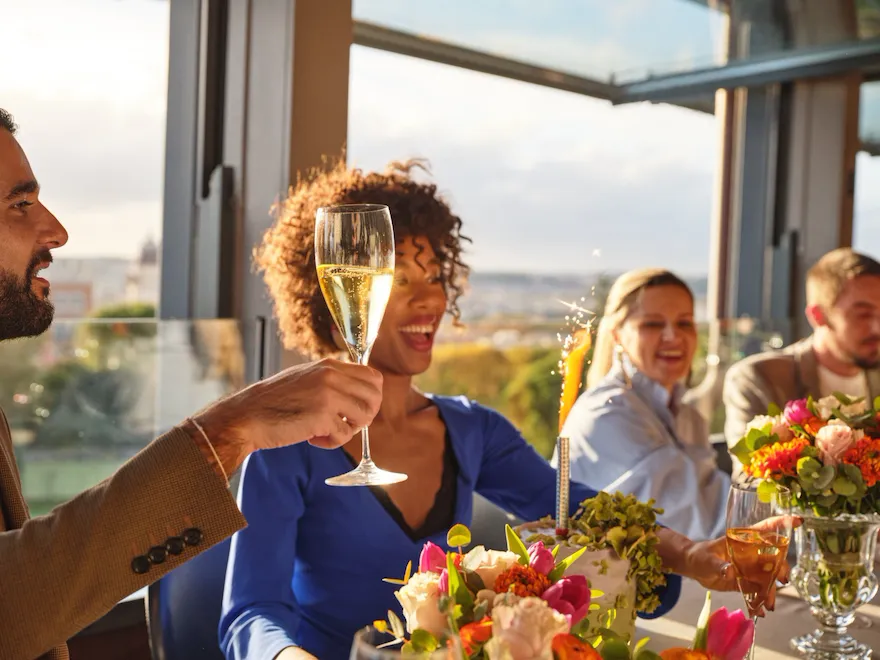 Portarit of a smiling girl celebrating her birthday at La Terrazza, Hotel Eden
