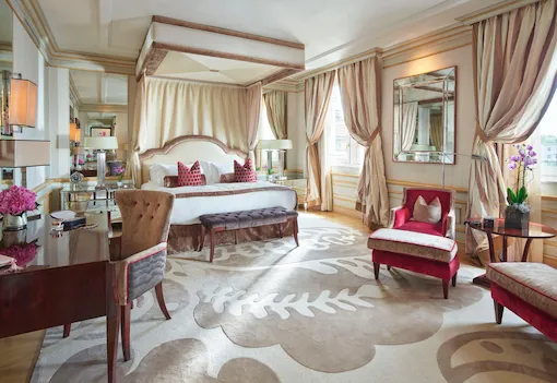 Imperial Executive Suite Bedroom enhanced with warm colours pieces of furniture