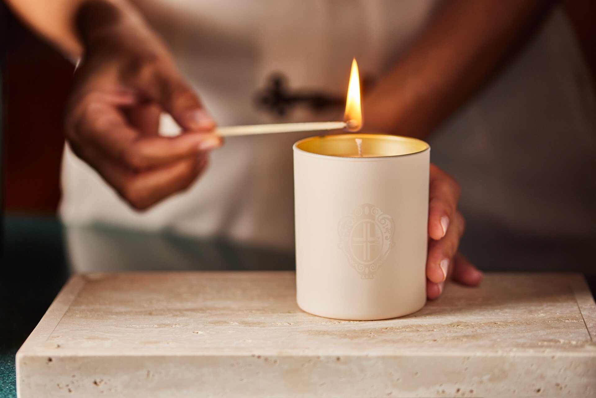 Lighting candle at Club 10