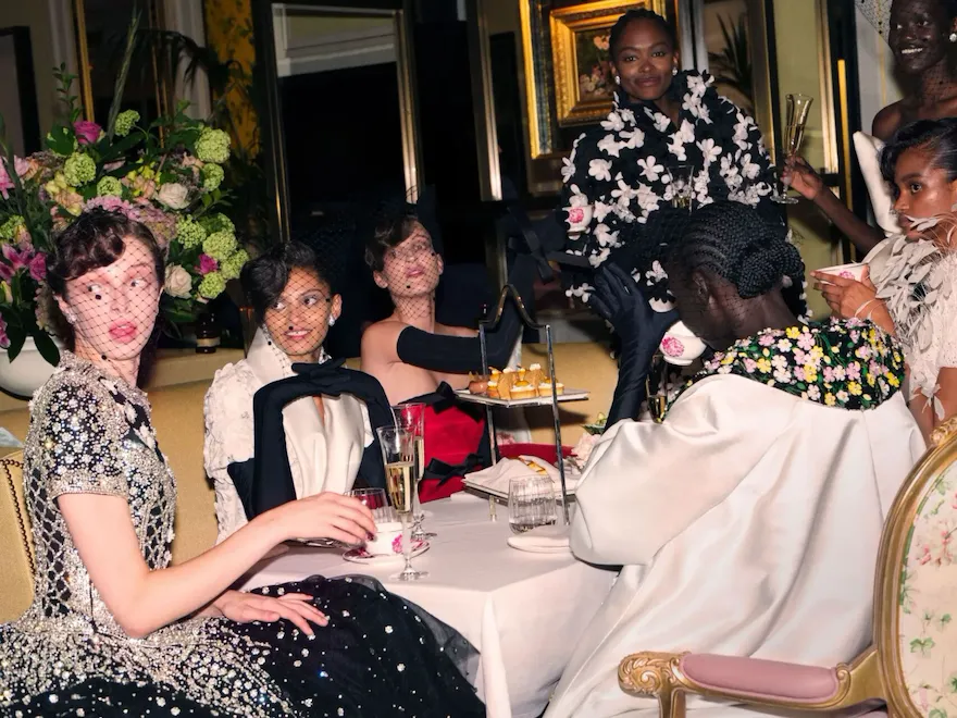 Female models enjoying aftrenoon tea experience at The Dorchester hotel.