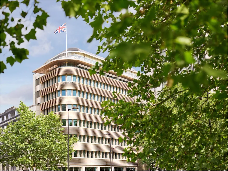 Exterior facade of 45 Park Lane London on a sunny day from Hyde Park, London
