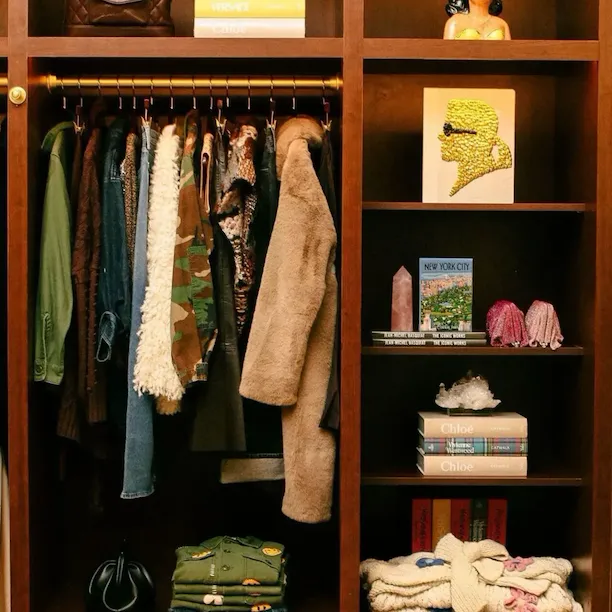 Vintage items displayed on wooden shelves