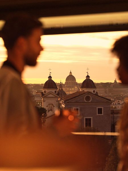Couple having a drink whist admining view at Il Giardino Bar