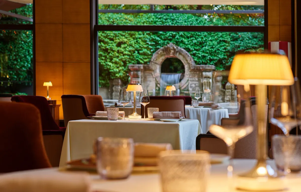 Acanto restaurant tables at Hotel Principe Di Savoia, Milan - dinner time