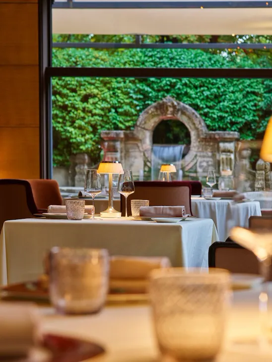 Acanto restaurant tables at Hotel Principe Di Savoia, Milan - dinner time