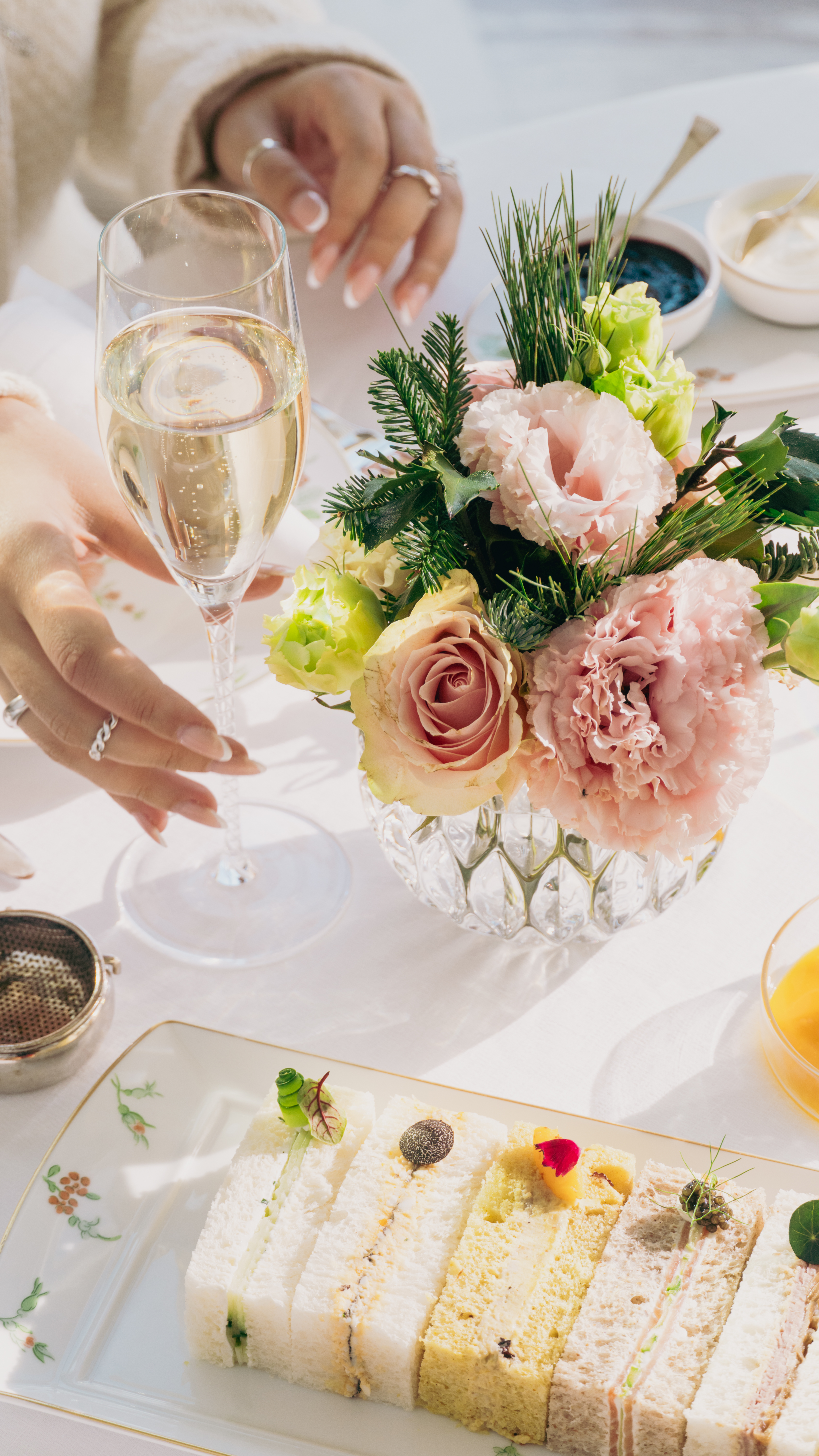  A close up at a champagne glass and sandwiches in The Gallery