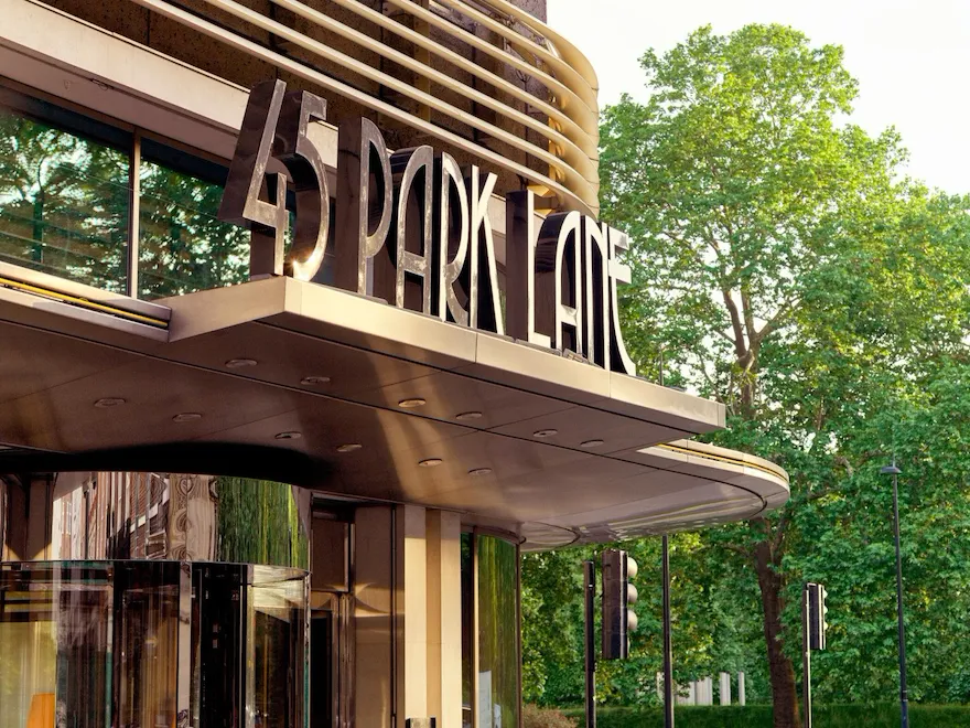 The exterior entrance of 45 Park Lane, London in daytime