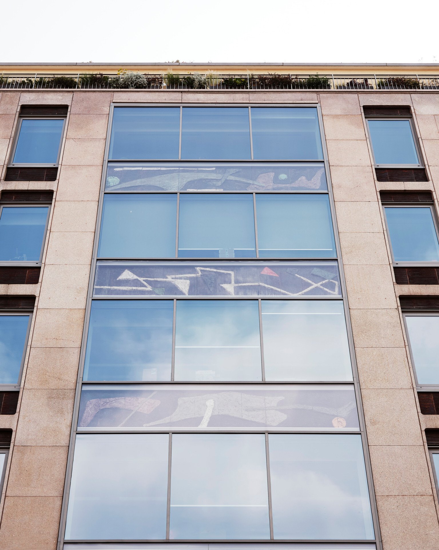 Frontal view of a building in Via Senato 11, Milan 