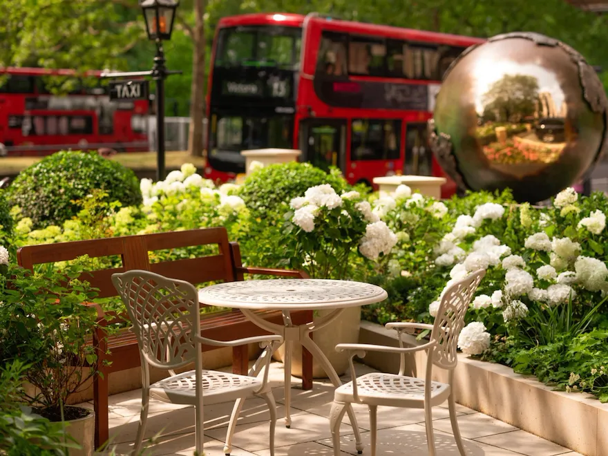 Images showing the different elements of The Dorchester in Bloom campaign including a Chelsea Flower Show afternoon tea at The Promenade, The Dorchester Garden, The Dorchester Spa candle and the Dorch in Bloom AR activation