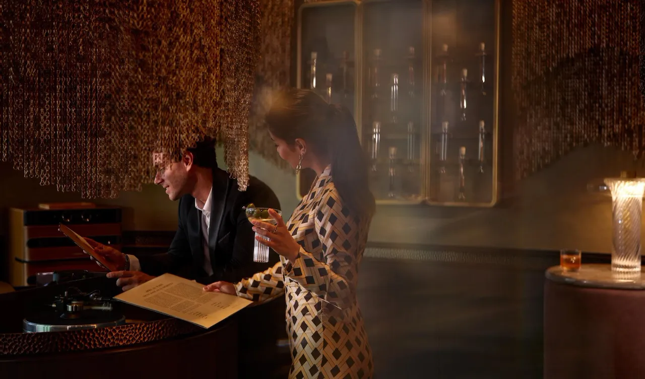 A couple enjoying drinks at Txakolina