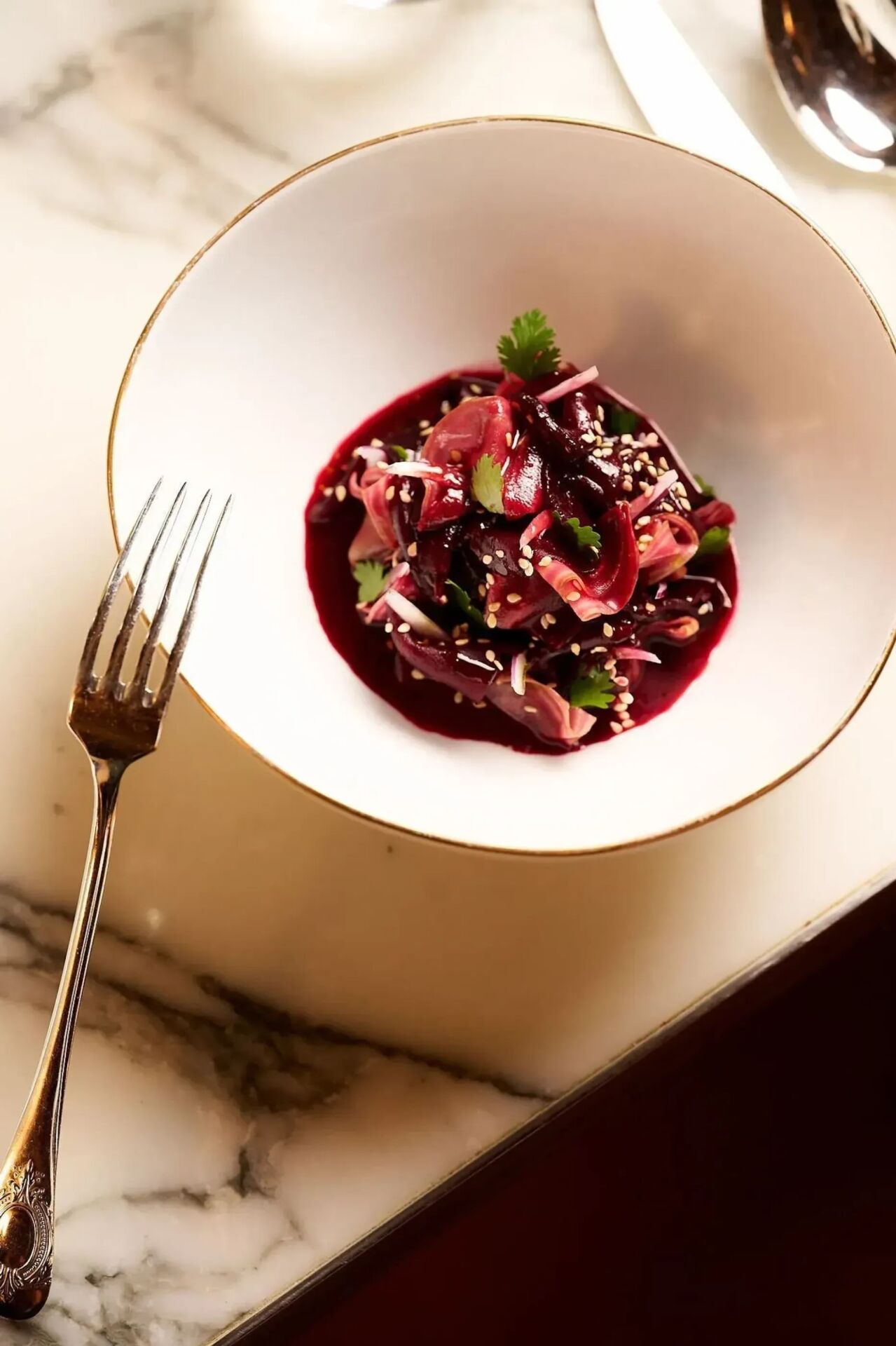 The photos are portrating the dishes of the september menu of Le Dali. The dishes are made with autumn ingredients: mushrooms, poultry, and beets.