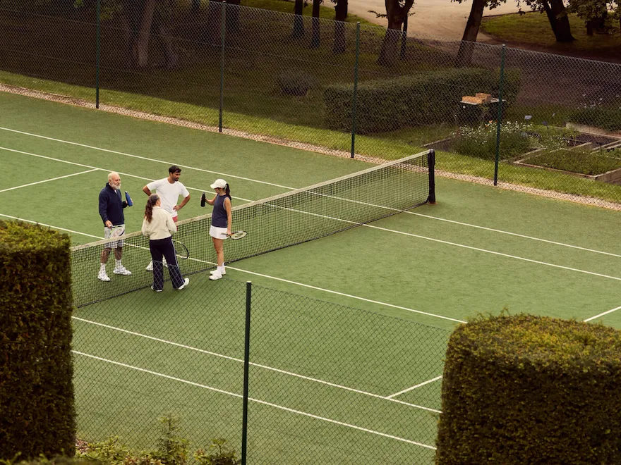 Lifestyle image of group of tennis players