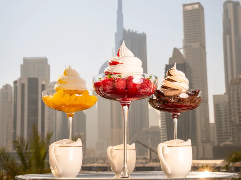 The three different flavors of Vacherin in front of Dubai Skyline