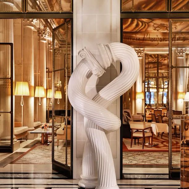 Front view of The Kiss sculpture in the lobby at Le Meurice, Paris - Dorchester Collection