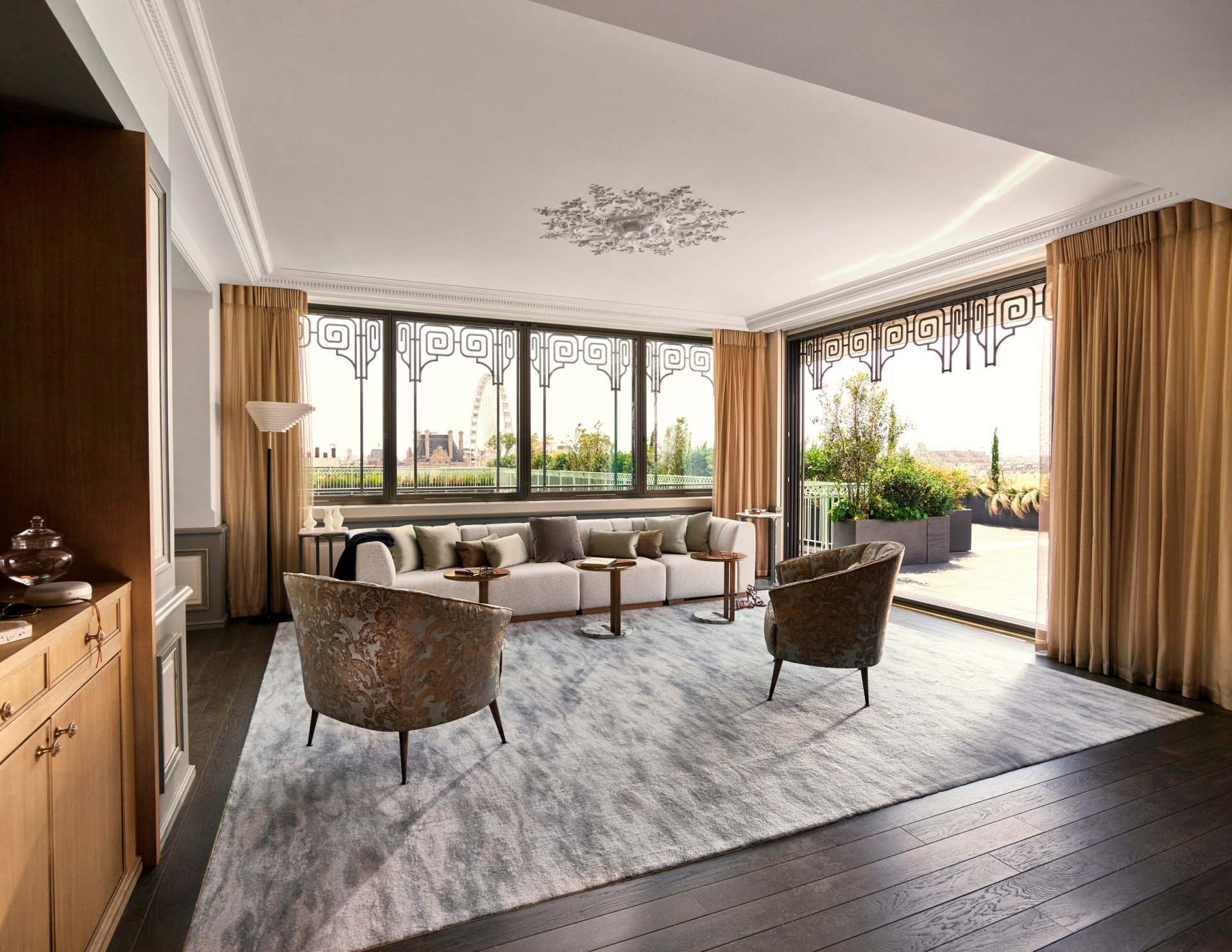 Living room with view of the terrace in the Belle Etoile suite at Le Meurice, Paris.