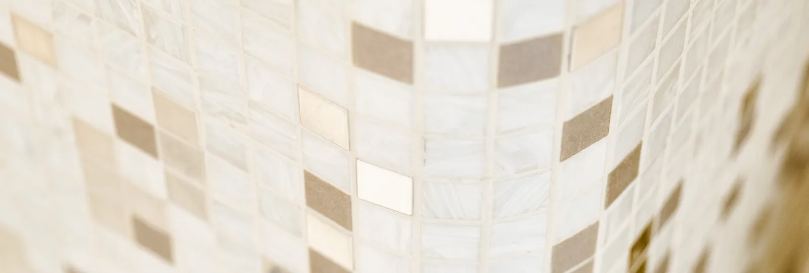 Detail of white marble tiles inside bathroom of Aurora Terrace Suite at Hotel Eden, Rome