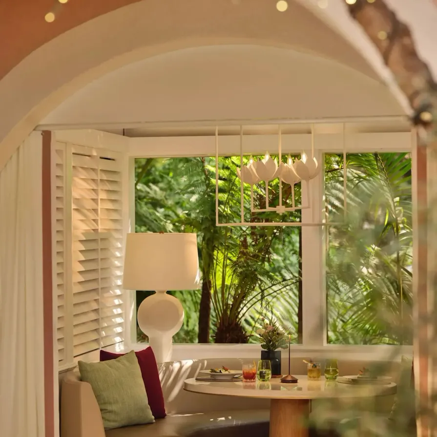 Alcove booth dinner moment in The Restaurant at Hotel Bel-Air