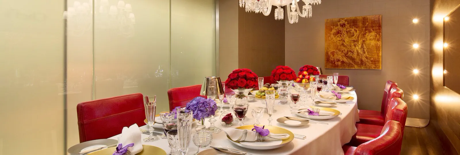The Dorchester - Chef's Table opaque glass + red roses and orchids and white table cloth