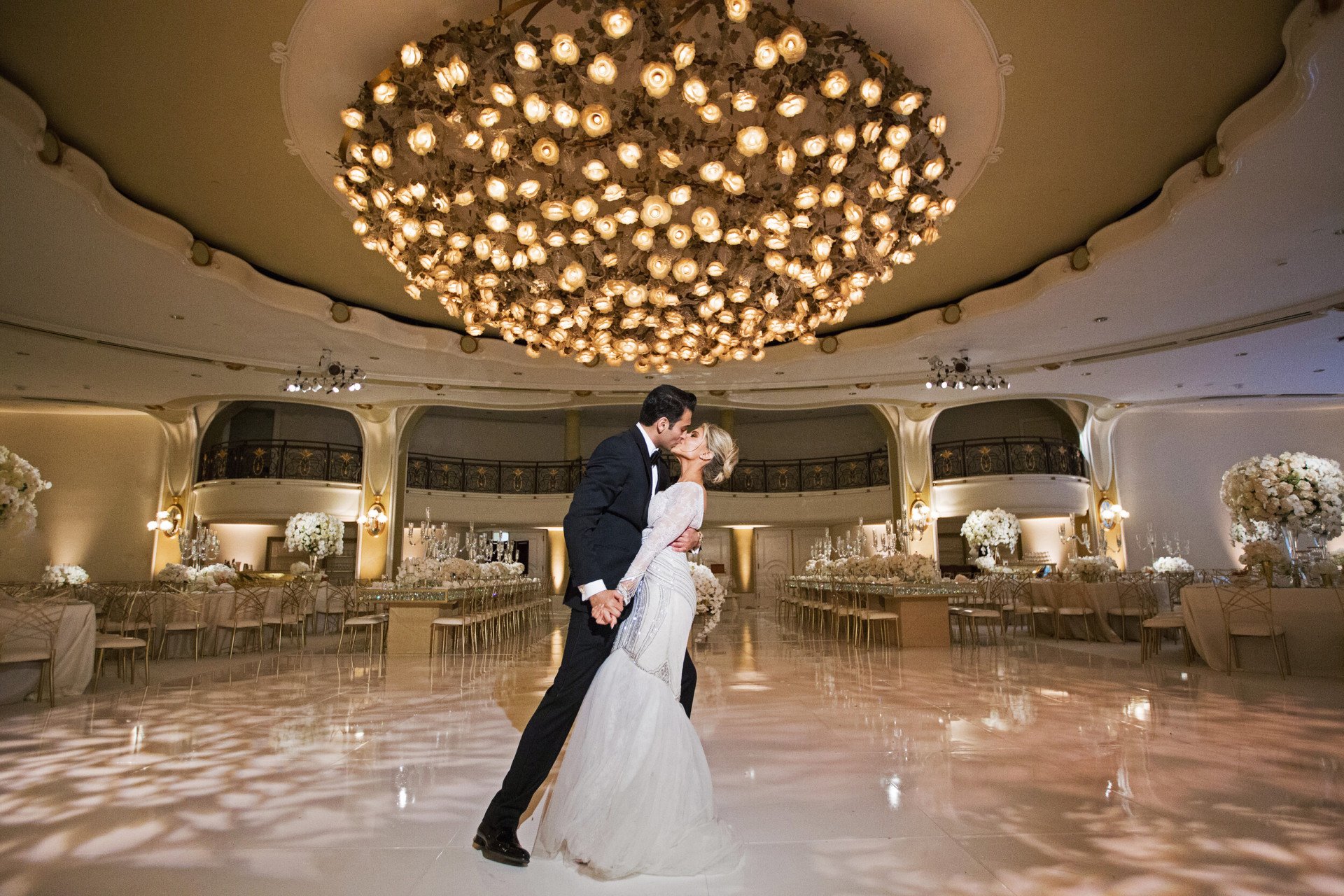 Wed couple kissing each other