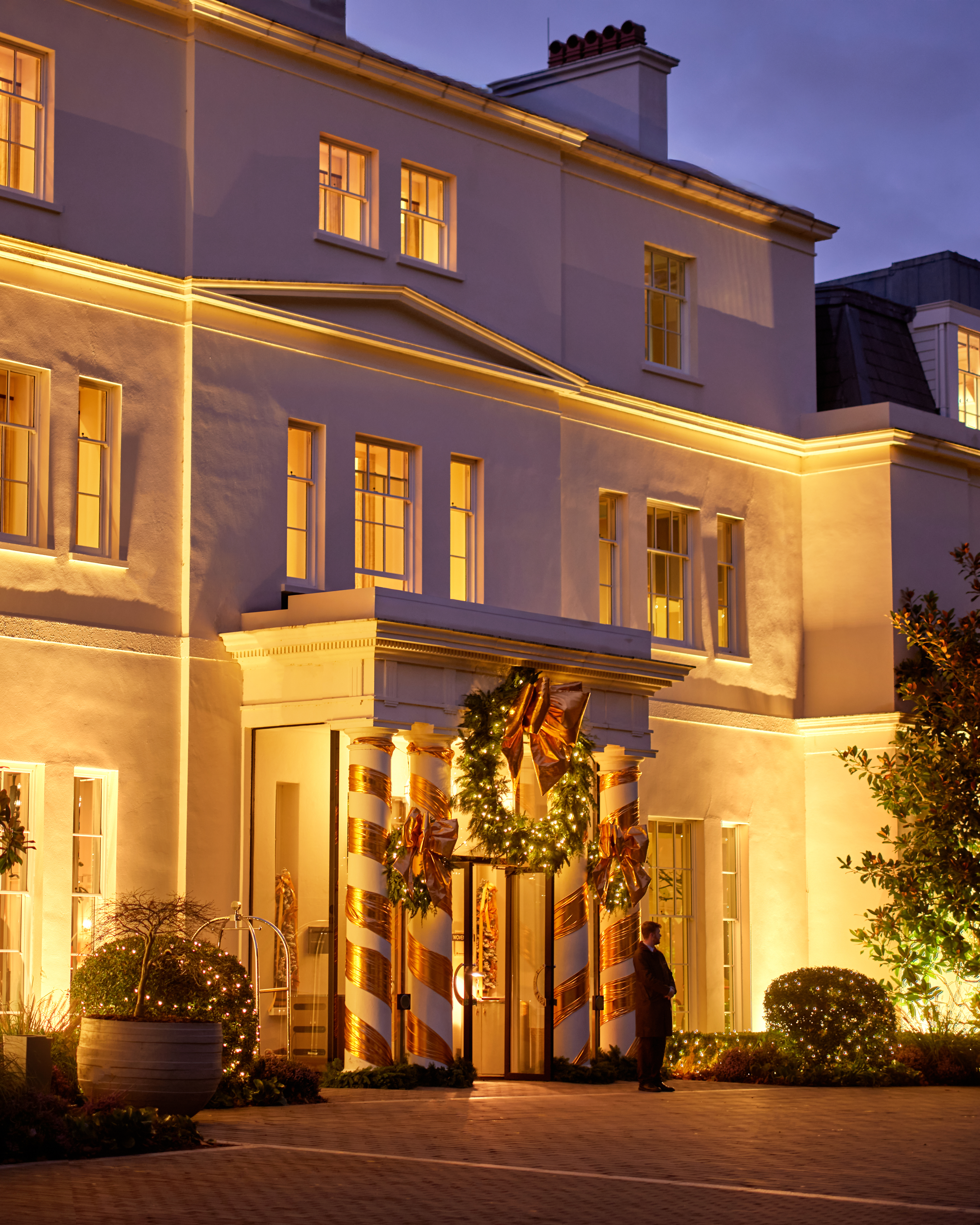 Festive exterior night time shot at Coworth Park, Ascot