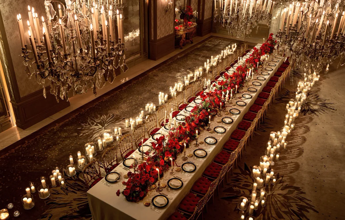 Chandelier behind the palm tree in Le Salon Haute Couture, at Hôtel Plaza Athénée, Paris - Dorchester Collection.