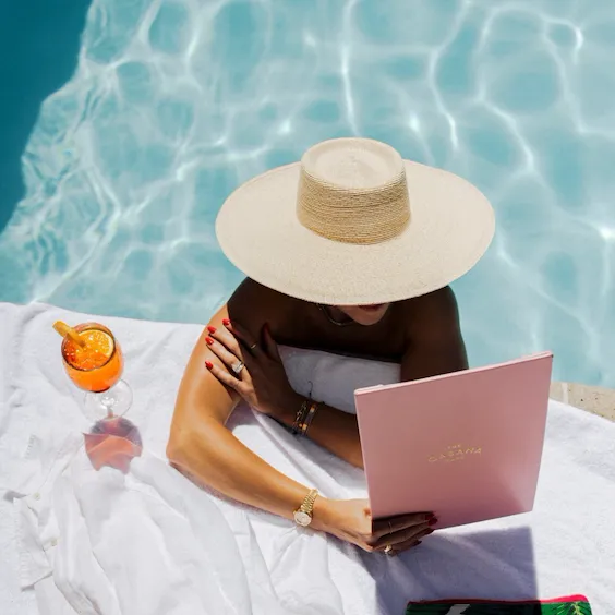 Model enjoying moment at the BHH pool