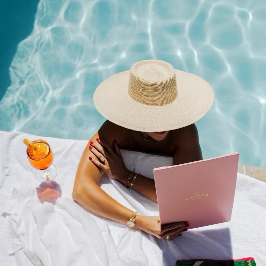 Model enjoying moment at the BHH pool