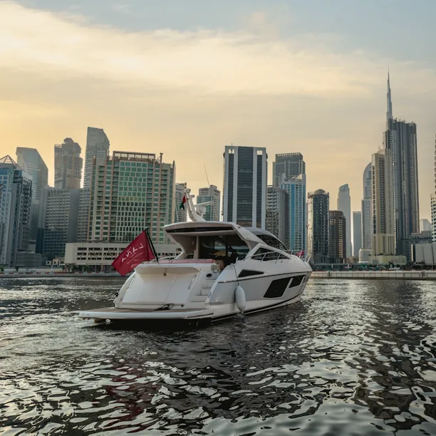The Lana boat in the Marina with the views of Burj Khalifa